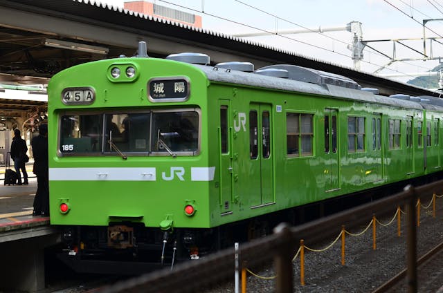 10-Day Japan Itinerary for First-Timers Bright Green Train at Kyoto Station Platform